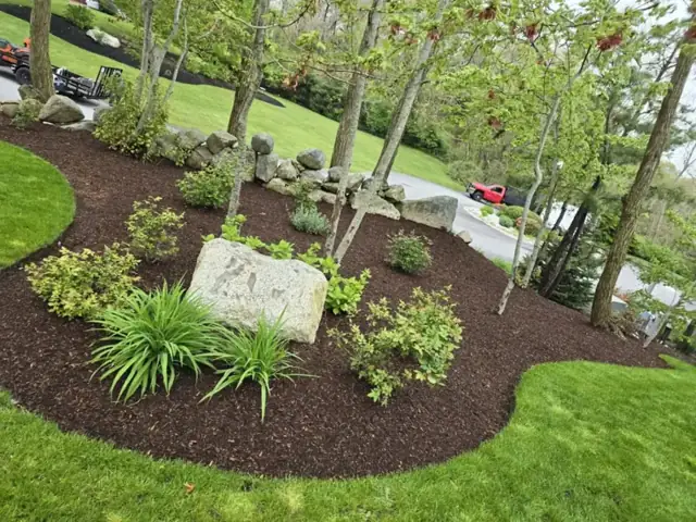 Landscape bed with stone accents